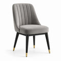 Chaise en velours gris avec pieds en bois et embouts dorés