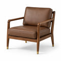 Fauteuil en cuir synthétique marron avec structure en bois de noyer